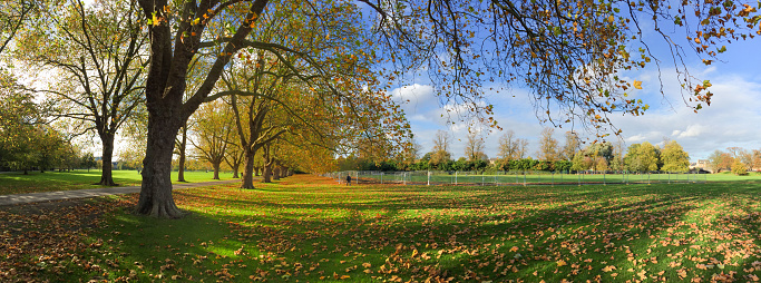 Cambridge, UK- October 25, 2014: The Campus of Cambridge in Autumn is very beautiful. Here is the stunning view of Jesus Green in October 2014.