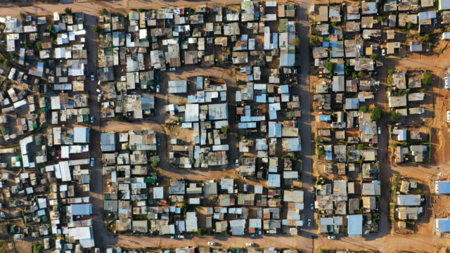 Aerial view of a landscape of an informal settlement in a poor area of South Africa. Township or shantytown, low income housing and poverty