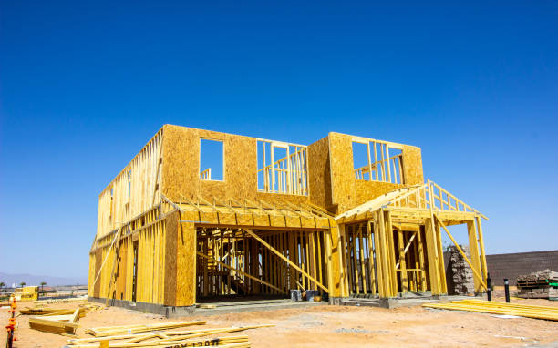 istock Two Story House In Framing Stage Of Construction 1395916835