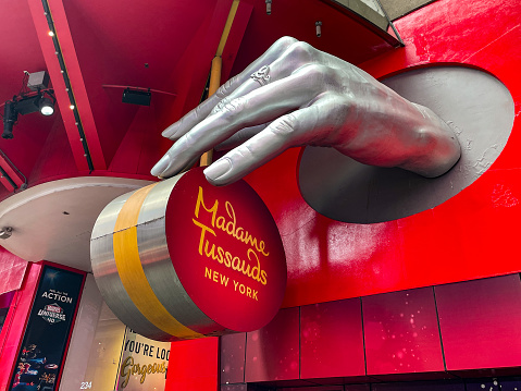 New York, 4-9-2022: Madame Tussaud's sign marks the entrance to the museum in Manhattan..