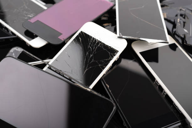 a heap with the broken screens lying one on top of another. devices are prepared for utilization - patch textile stack heap imagens e fotografias de stock
