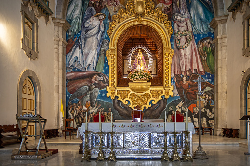 View to the main altar in Basilica de Nuestra Senora de Candelaria or The Basilica of the Royal Marian Shrine was built in 1959 in a primary neoclassical style and is located in city Candelaria on the east coast of the Spanish Canary Island Tenerife
