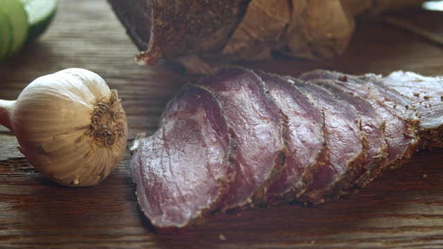 Dried meat on a cutting board.