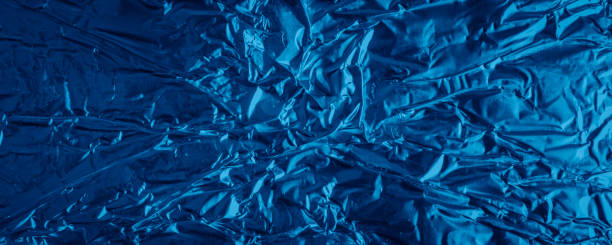 istock blue aluminum foil with a visible texture. background 1395929072