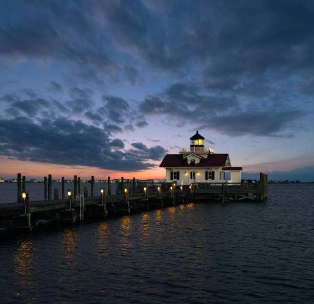 istock Twilight over the Roanoke Marshes Lighthouse 1395932368