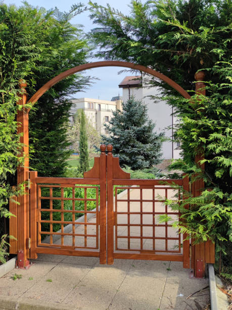 istock light decorative wooden gate in the park 1395933734