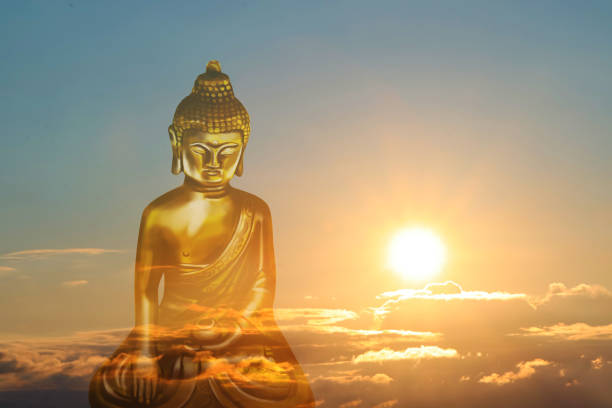 istock Golden Buddha sculpture and beautfiful sky at sunset on background 1395933843