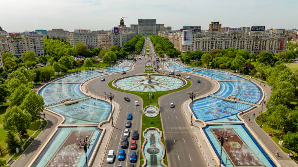 Aerial view of Unirii Square, Bucharest Romania on a sunny day. Mavic 3 4k drone shot of a urban metropolitan area at Bucharest bucharest stock pictures, royalty-free photos & images