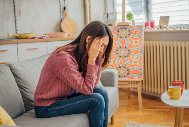 istock Woman having a headache 1395937556