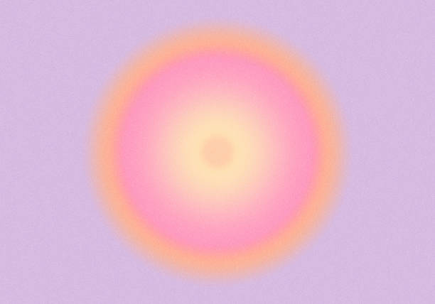 Blurred round circle gradient background with grain texture. Pink and orange colors.