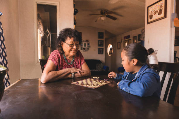istock Grandmother playing games with Grandson 1395938897