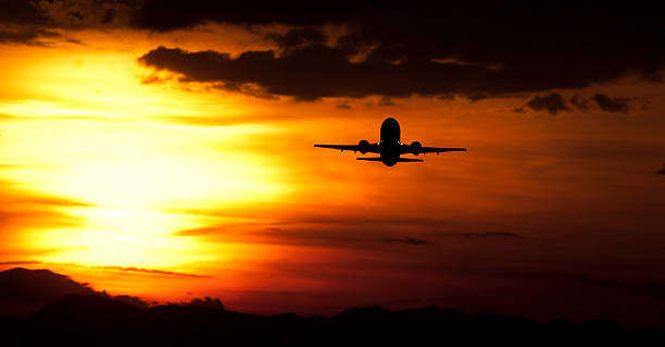 istock Sunset commercial airplane 139593989