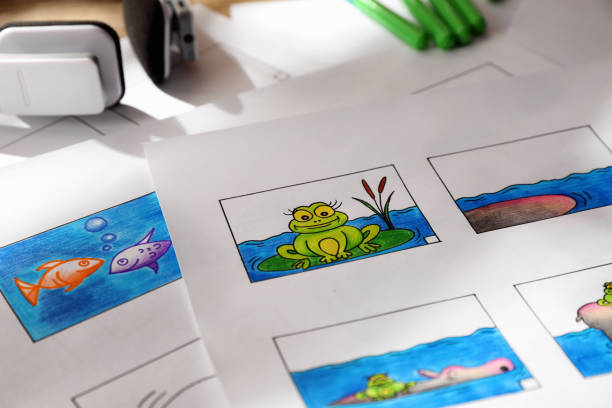 Storyboards with cartoon sketches at workplace. Pre-production process