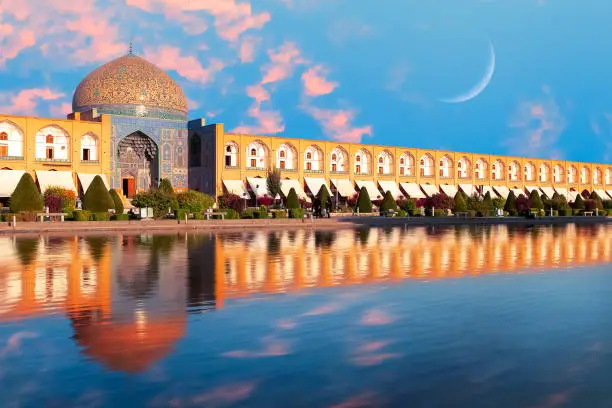 Photo of Iran. Persia. Isfahan. Dome of Sheikh Lotfollah Mosque at Naqsh-e Jahan square in Isfahan at sunset.