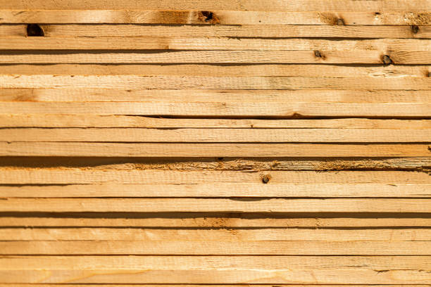 A pallet of planks awaits delivery.