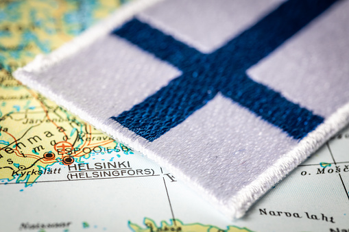 Finland flag on the map, highlighted Helsinki. The capital of the country