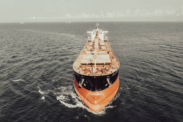 istock Aerial view of cargo ship in transit. 1395946706