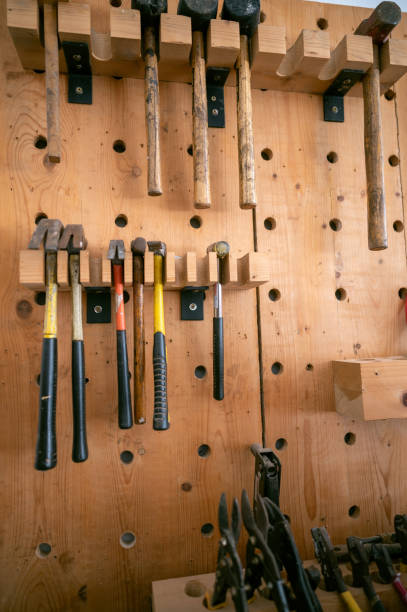 Hummers Tools hanging on the wall in the carpentry workshop.