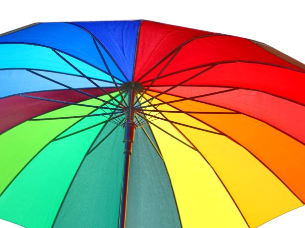 istock umbrella with colorful wedges and black background 1395949344