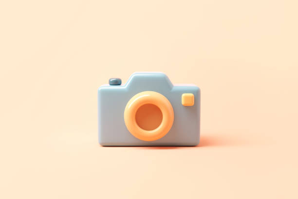 istock Minimal photo camera with lens and button on pastel background. 1395949413