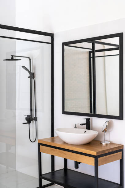 istock Modern bathroom design idea with transparent shower 1395951538