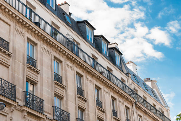 istock Facade of a typical central Paris apartment building 1395952413