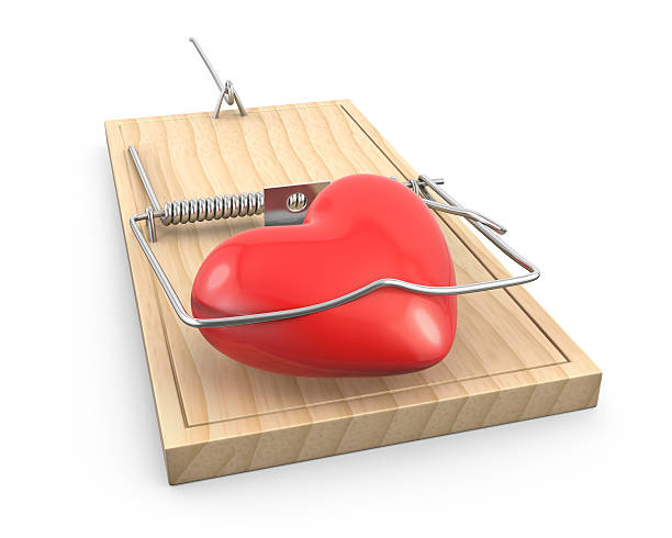 istock Heart caught in a mouse trap 139595462