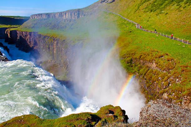 at gullfoss waterfall showing a double rainbow (iceland) - gullfoss falls imagens e fotografias de stock