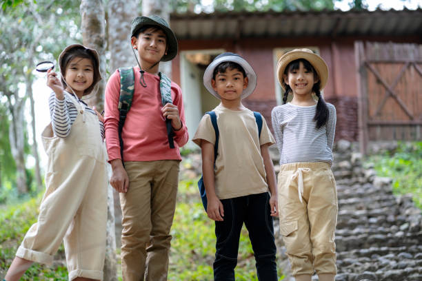 Group of Asian students going on field trips. educational concepts, adventures. stock photo