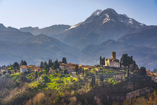 Barga town and Alpi Apuane mountains in winter. Garfagnana, Tuscany, Italy Europe