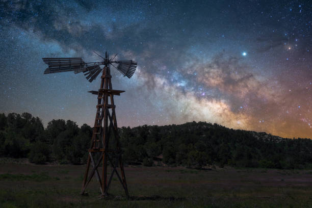 istock An old decaying windmill against the night sky 1395968488
