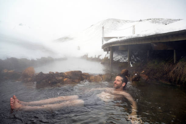 istock Visiting Hot Springs in Iceland during winter 1395968727