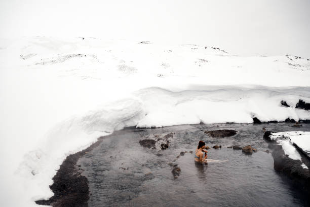 istock Visiting Hot Springs in Iceland during winter 1395968734