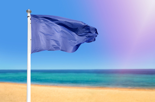 The blue flag is an international award for beaches and marinas.