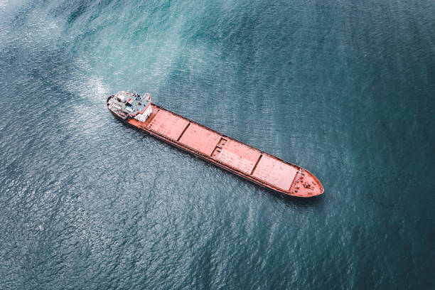 istock Aerial view of cargo ship in transit. 1395972061
