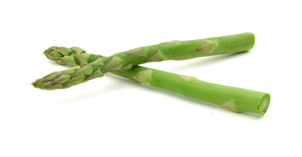 istock Fresh green asparagus on white 1395976947
