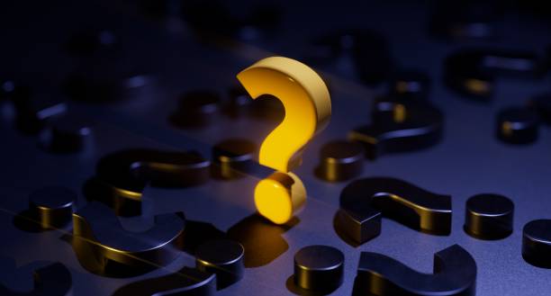 istock Q And A Concept - Yellow Question Mark Glowing Amid Black Question Marks On Black Background 1395979904