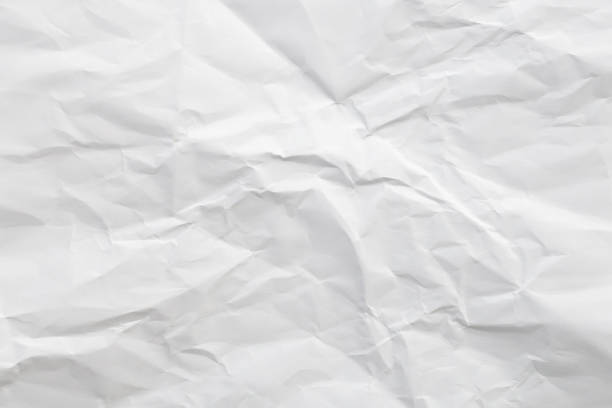 istock White crumpled and creased paper texture background 1395990235