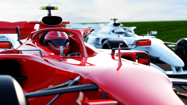 istock driver of red race car 1395990459