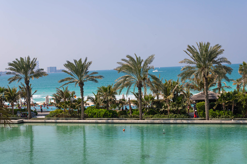 Aerial view of beach road and resorts of Marjan Island in the emirate of Ras al Khaimah in United Arab Emirates