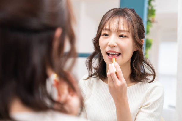 istock attractive asian woman beauty image,lipstick, 1395994434