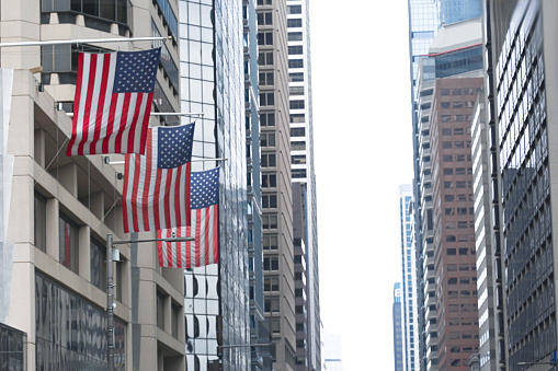 US flags and corporate buildings