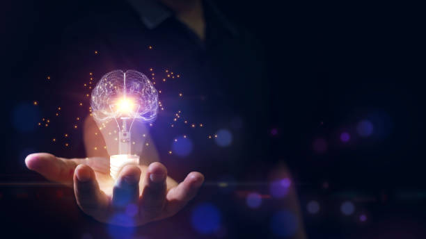 istock Double exposure Businessman Holding Light Bulbs with Brain Inside, Creative and Innovative Inspiration, Solution Analysis and Development, Innovative Technology. 1396013973