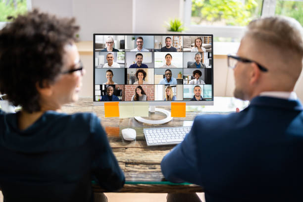 istock Businesspeople Video Conferencing With Their Partner On Computer 1396023793
