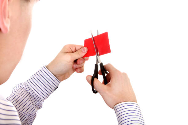 istock Person cutting a Credit Card 1396027790
