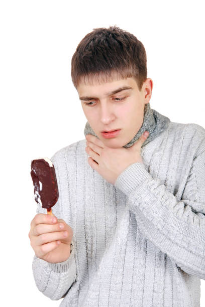 istock Sick Teenager with Icecream 1396028029