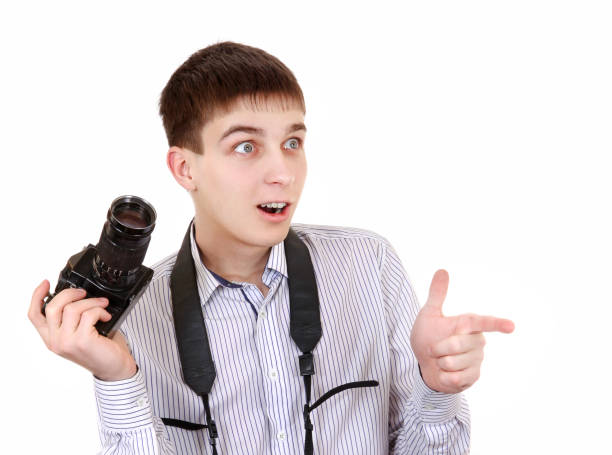 istock Teenager with Photo Camera 1396028048