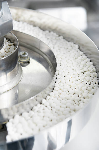 istock pharmacy medicine pill production background 139602912