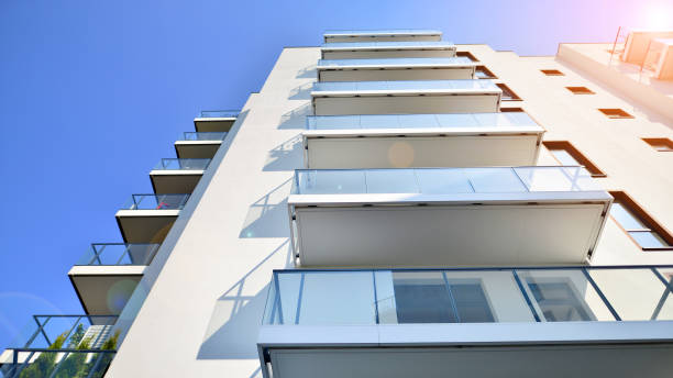 istock Modern luxury residential flat. Modern apartment building on a sunny day. 1396032225