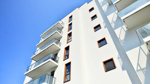 istock Modern luxury residential flat. Modern apartment building on a sunny day. 1396032239